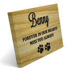 Angled view of personalised sandstone pet memorial plaque on stand